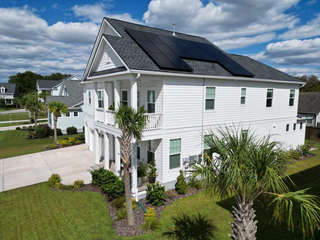 white house with solar on side